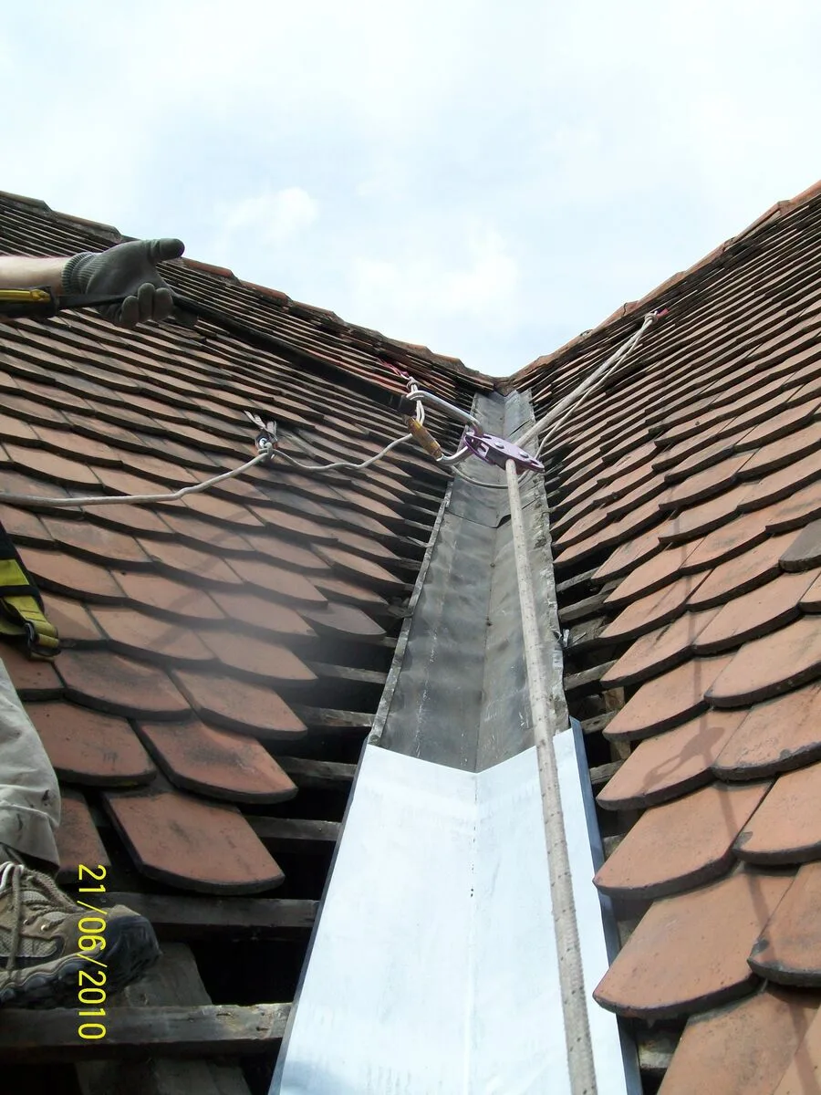 Couverture et zinguerie - rénovation complète Toiture rénovée après travaux d'amélioration énergétique